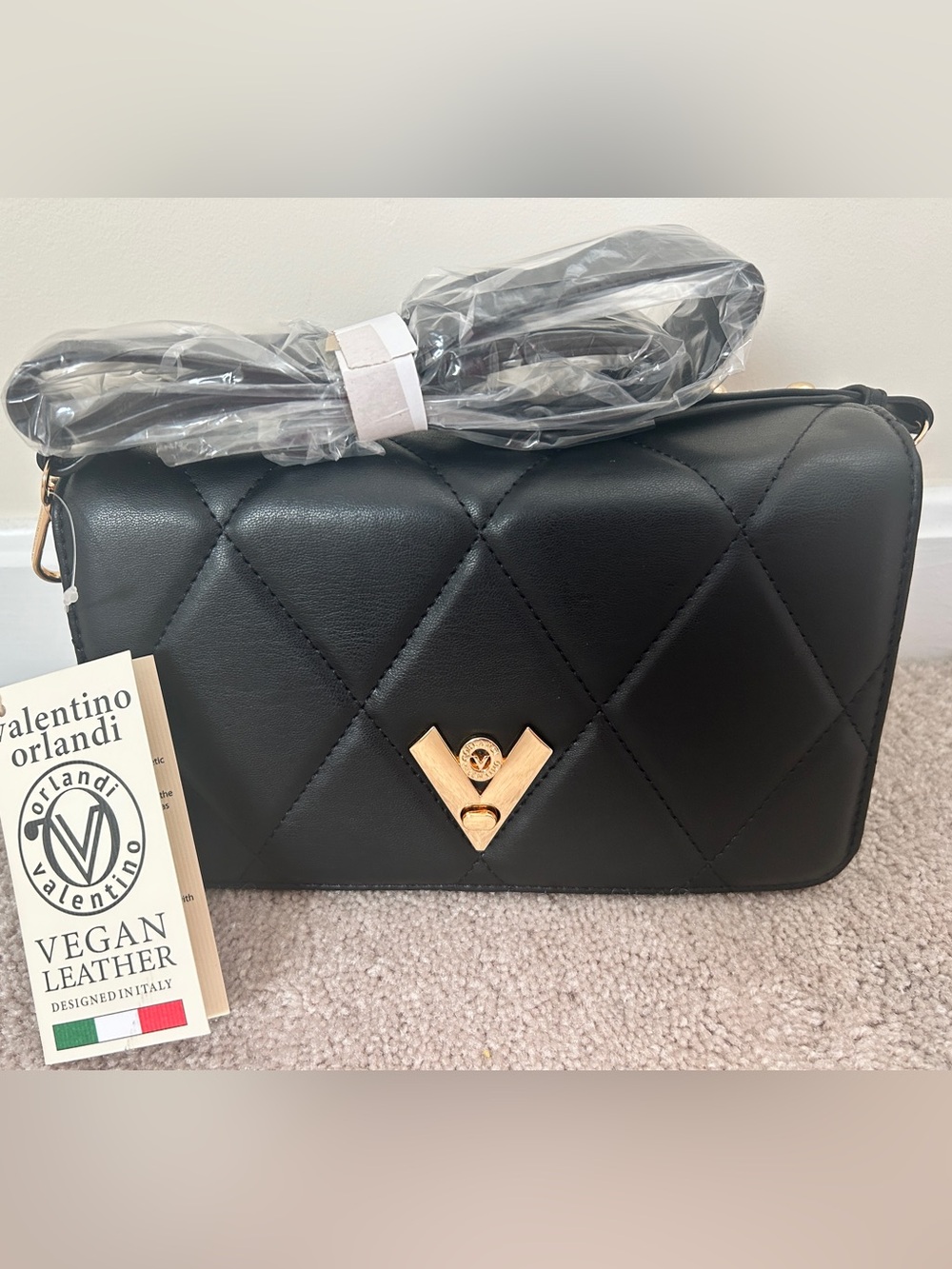 Brand new Quilted Black Crossbody Bag with Gold Accent